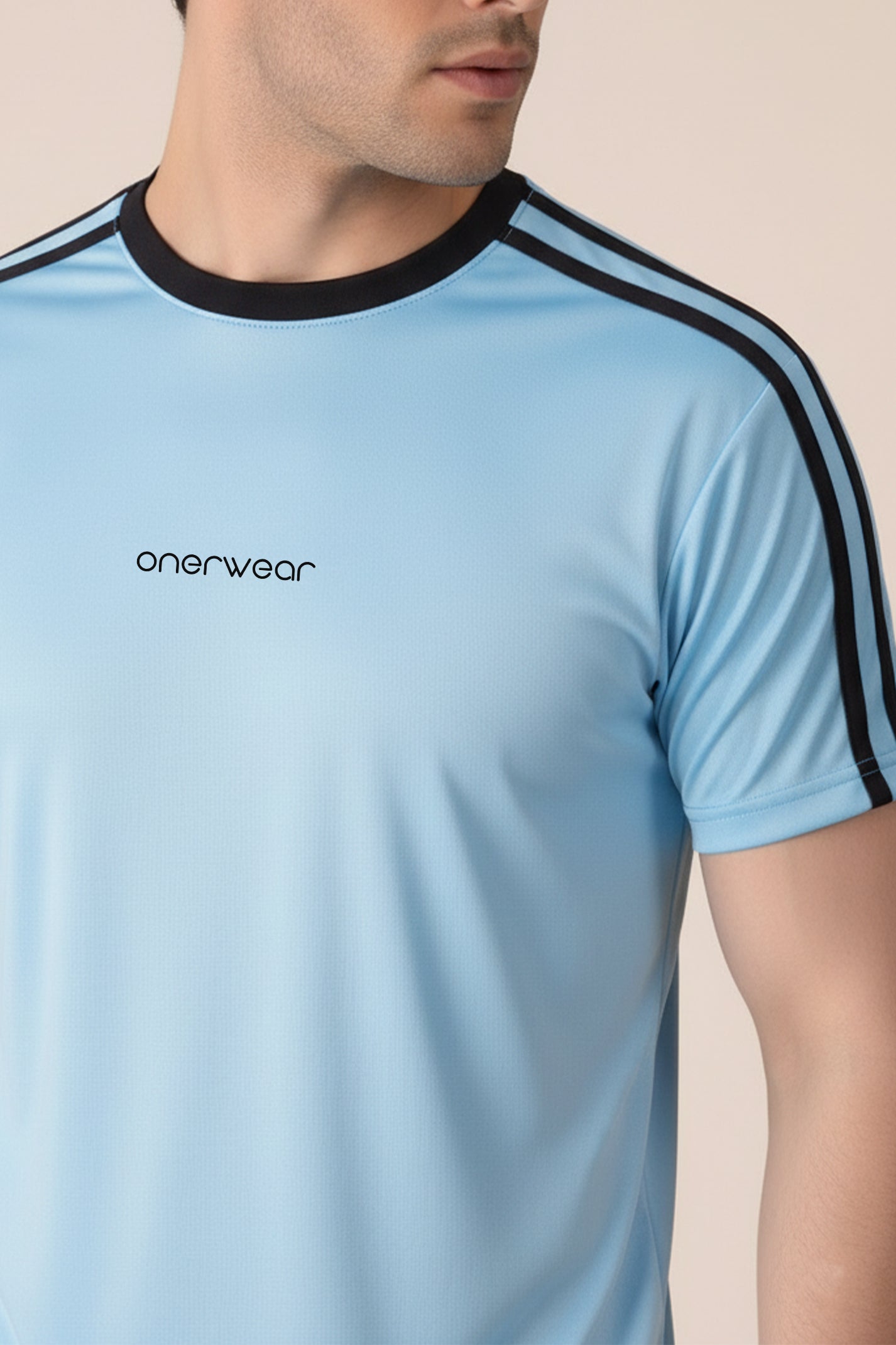 Light blue t-shirt with black stripes on sleeves and neckline, featuring 'onerwear' brand logo.